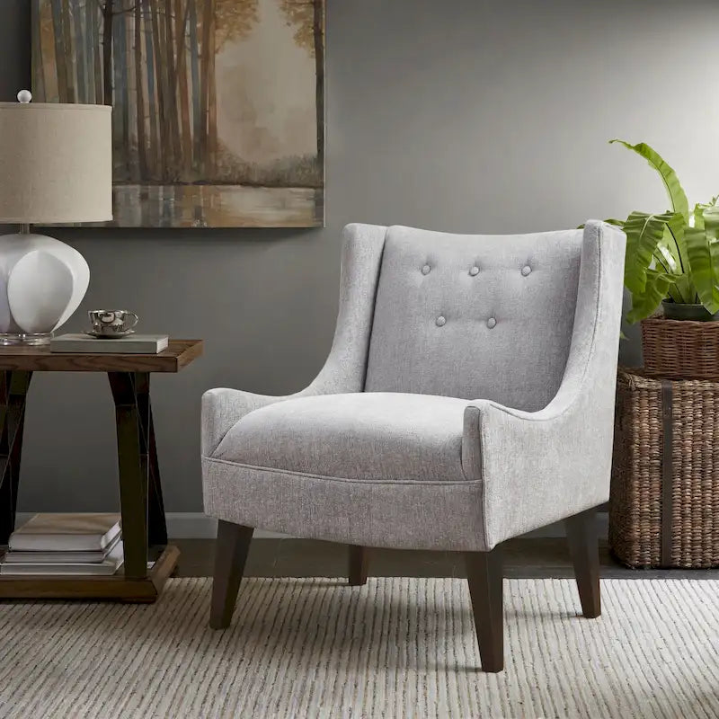 Beige-colored button-down fabric lounge chair