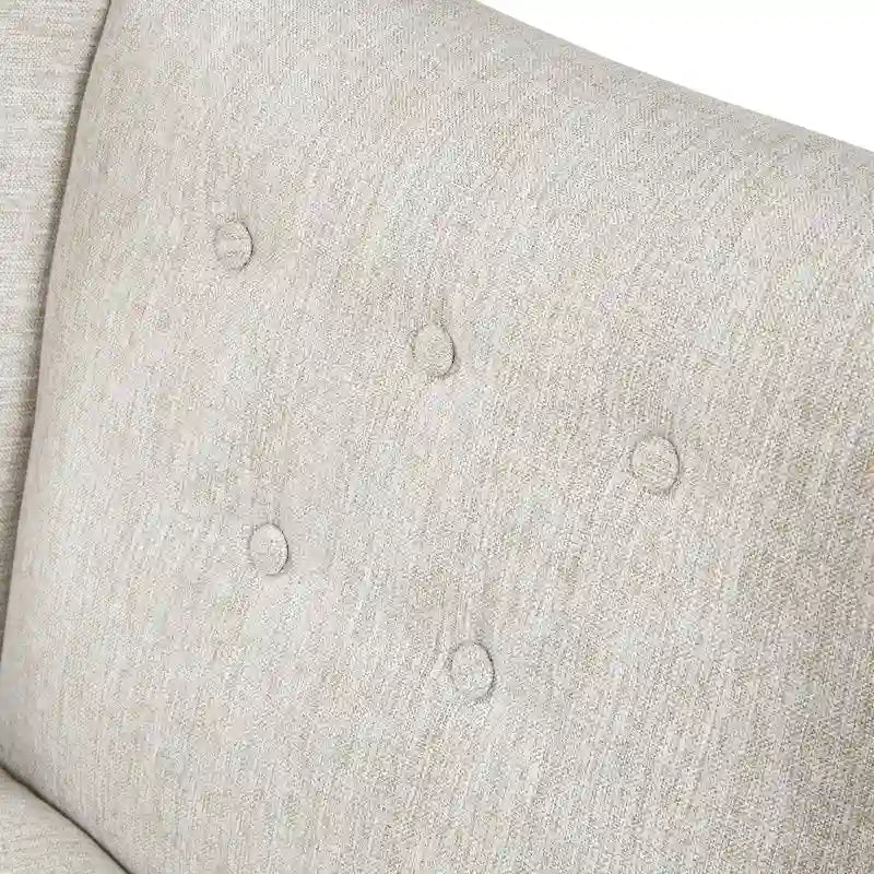 Beige-colored button-down fabric lounge chair