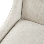 Beige-colored button-down fabric lounge chair