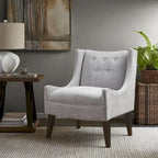 Beige-colored button-down fabric lounge chair