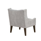 Beige-colored button-down fabric lounge chair