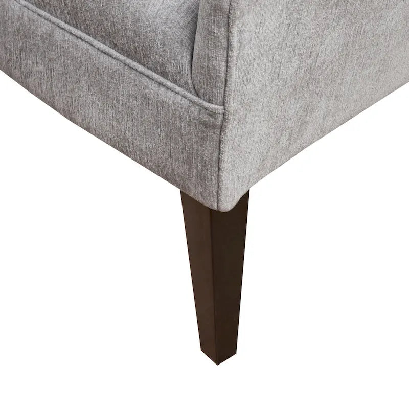 Beige-colored button-down fabric lounge chair