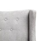 Beige-colored button-down fabric lounge chair